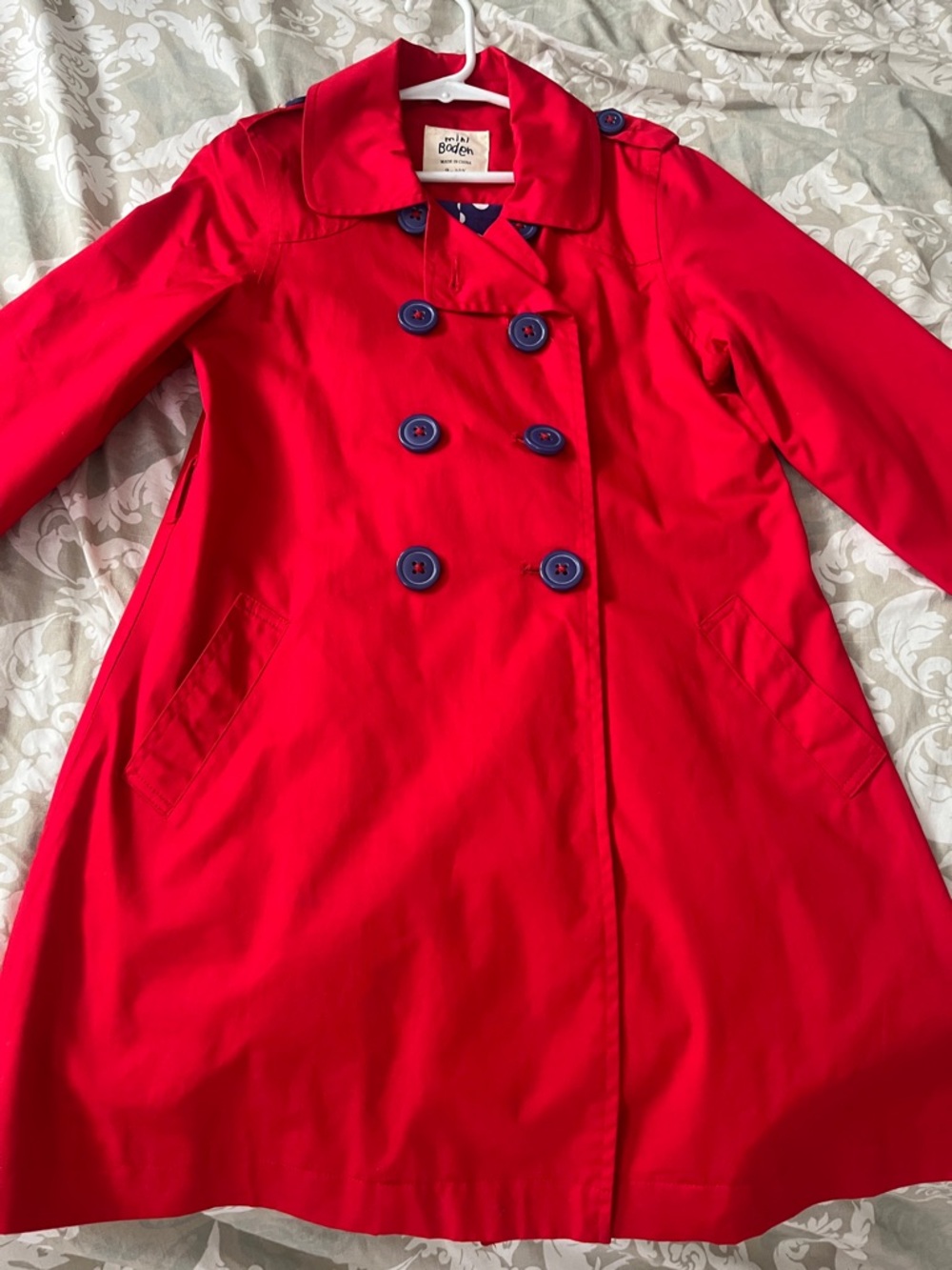 Mini Boden Kid’s trench coat. Beautiful red color with blue buttons! Size 9-10y